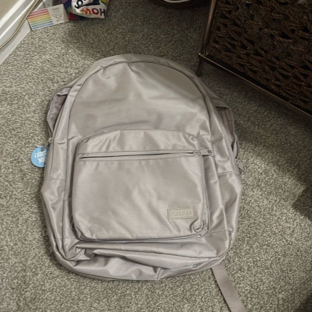 Grey NWT calpak travel “Glenroe” backpack tons of pockets